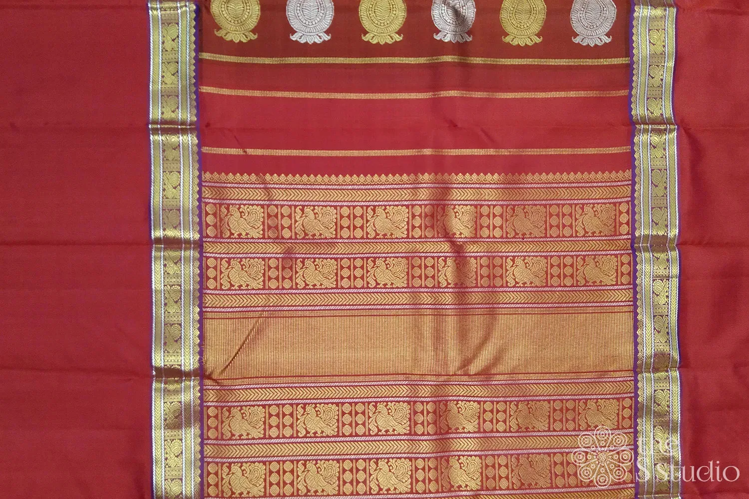 Brown kanchi pattu saree with red border