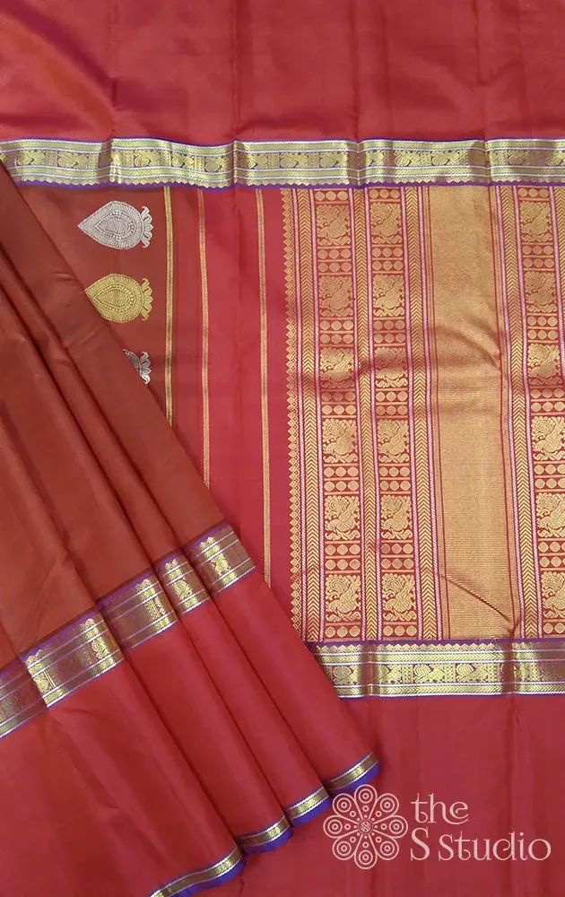 Brown kanchi pattu saree with red border