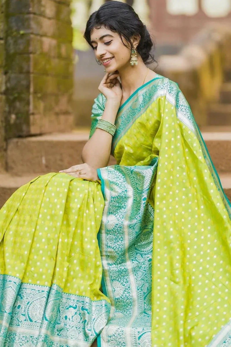 Enticing Parrot Soft Silk Saree With Blooming Blouse Piece