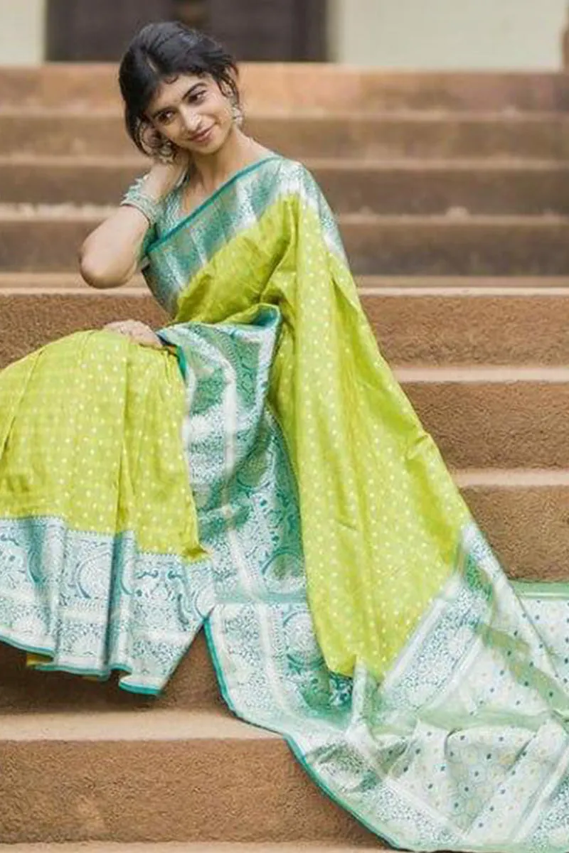 Enticing Parrot Soft Silk Saree With Blooming Blouse Piece