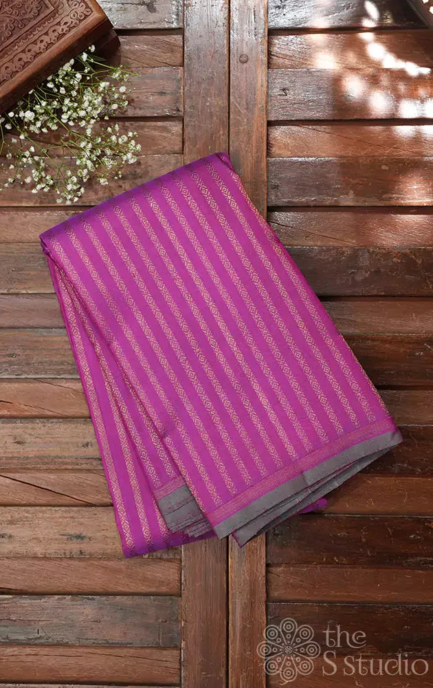 Magenta kanchipuram silk saree with vertical golden zari lines