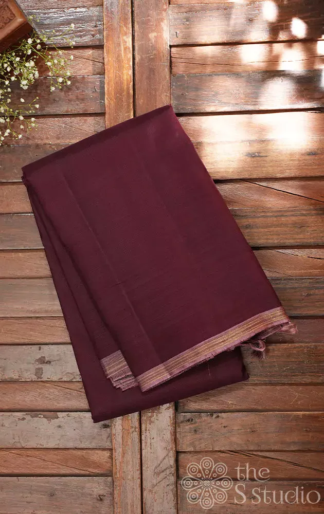 Maroon plain kanchi silk saree with onion pink pallu