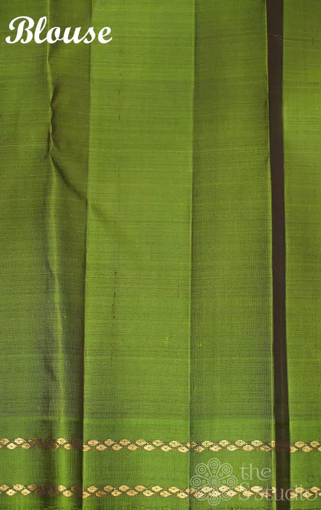 Purple kanchipuram silk saree with kamalam butta and contrast border and pallu