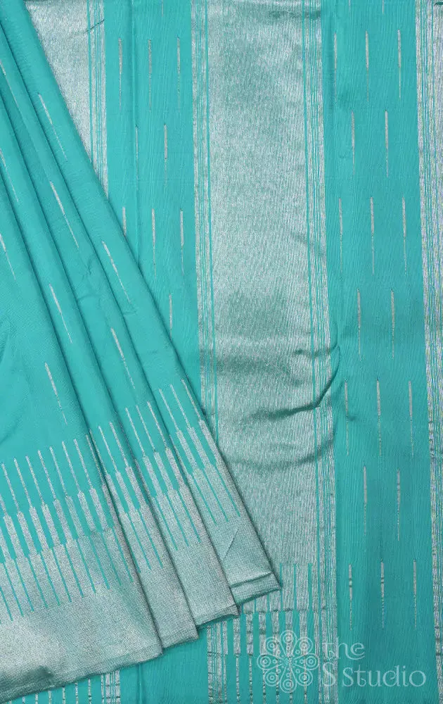 Sea green kanchi silk saree with silver zari seepu reku design border