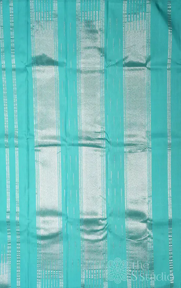 Sea green kanchi silk saree with silver zari seepu reku design border