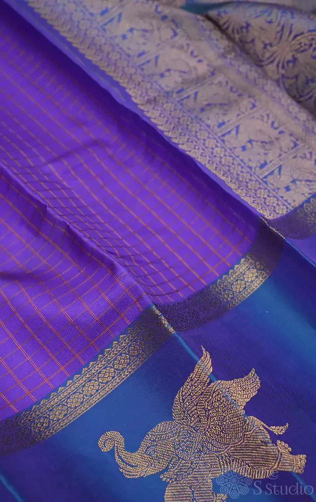 Violet kanchi silk saree with elephant motifs border