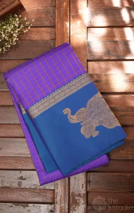 Violet kanchi silk saree with elephant motifs border